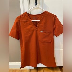 FIGS burnt orange scrub top